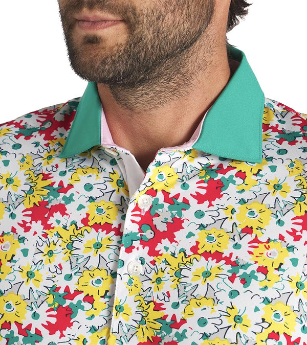 Puma Mens AP Floral Polo Shirt closeup of collar in  White Glow / Pele Yellow with a vibrant all over abstract floral. The collar is the solid coordinating color with a lighter contrast color for the inner collar and the 3 button inner placket.