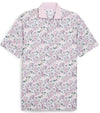 Puma Mens AP Floral Golf Polo Shirt Front in White Glow / Pale Pink with a vibrant all over abstract floral. The collar is the solid coordinating color with a lighter contrast color for the inner collar and the 3 button inner placket.