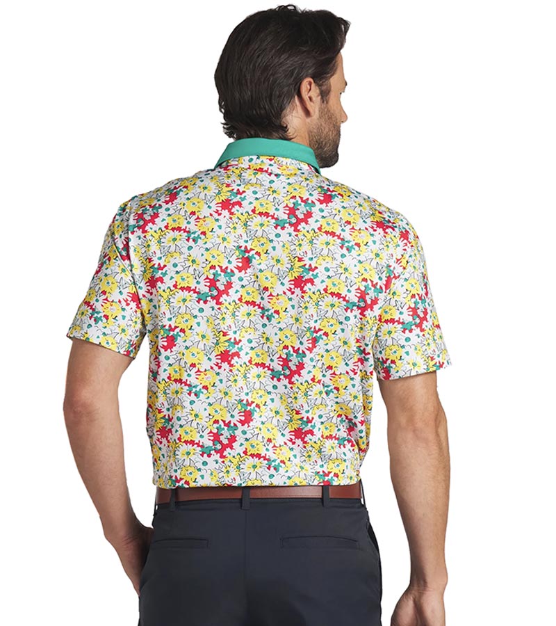 Puma Mens AP Floral Polo Shirt Model -back in  White Glow / Pele Yellow with a vibrant all over abstract floral. The collar is the solid coordinating color with a lighter contrast color for the inner collar and the 3 button inner placket.