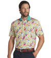 Puma Mens AP Floral Polo Shirt Model Front in  White Glow / Pele Yellow with a vibrant all over abstract floral. The collar is the solid coordinating color with a lighter contrast color for the inner collar and the 3 button inner placket.