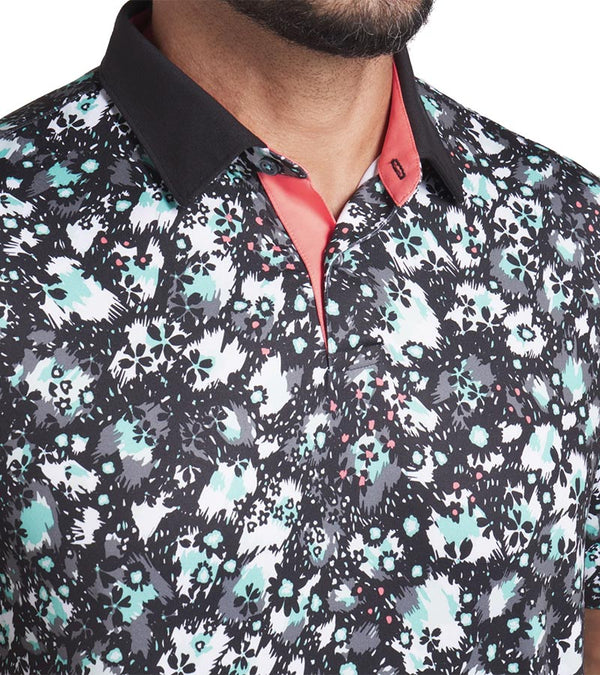 Puma Mens CLOUDSPUN Abstract Camo Golf Polo Shirt closeup of collar in Puma Black / Aquatic with an all over abstract floral camo pattern with a black collar and pink coral accent on the inner collar and 3 button placket.