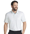 Puma Mens CLOUDSPUN Watering Hole Golf Polo Shirt Model - Front in Warm White / Silver Sky with a small all over print of scattered plants. There is a 3 button placket. Inner collar and placket are a solid Silver Sky co-ordinating color.