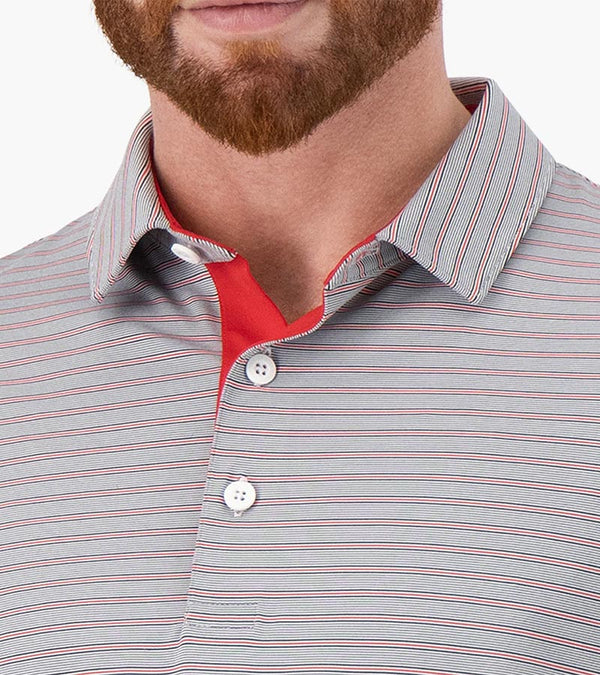 Puma Mens MATTR Bay Golf Polo closeup of collar in Canada Red with simple thin stripes in different colors and contrast button placket lining at the collar.