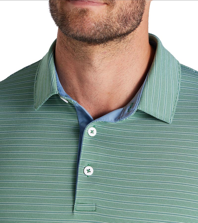 Puma Mens MATTR Bay Golf Polo closeup of collar in Vine / Zen Blue with simple thin stripes in different colors and contrast button placket lining at the collar.