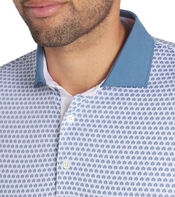 Puma Mens MATTR Century Golf Polo closeup of collar in Blue Horizon / Mauved Out with a micro all-over pattern print and contrasting collar with vibrant inner placket color that adds a pop of color