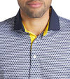 Puma Mens MATTR Century Golf Polo closeup of collar in Deep Navy / Pele Yellow with a micro all-over pattern print and contrasting collar with vibrant inner placket color that adds a pop of color.