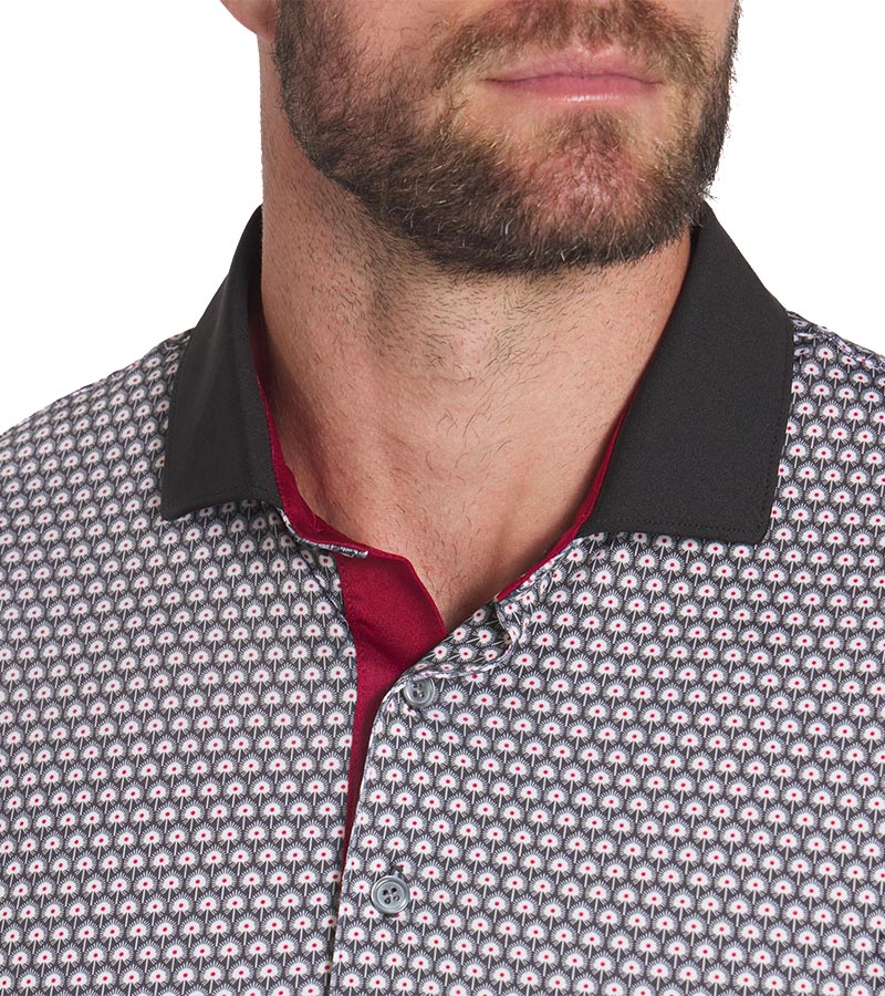 Puma Mens MATTR Century Golf Polo closeup of collar in Warm White / Intense Red with a micro all-over pattern print and contrasting collar with vibrant inner placket color that adds a pop of color. 