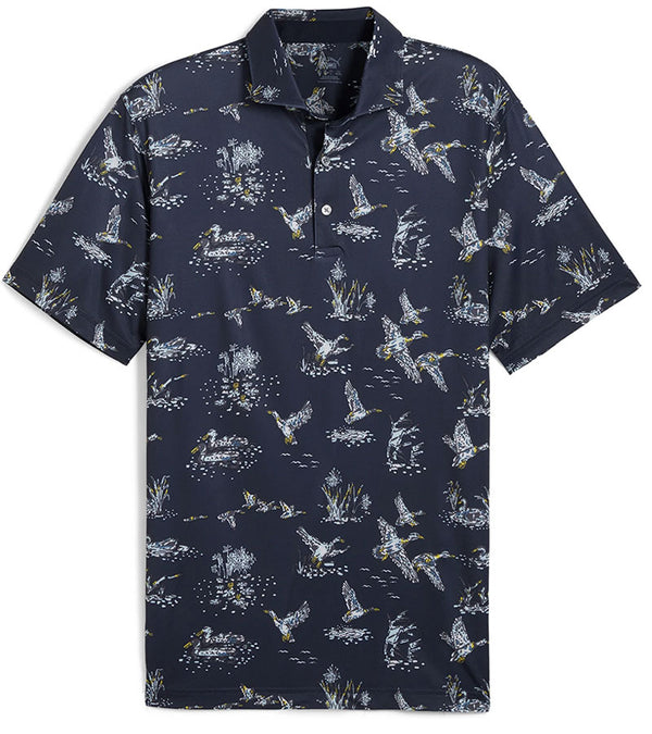 Puma Mens MATTR Flock Golf Polo Front in Deep Navy / Pele Yellow stripe in a duck wild life print on navy.