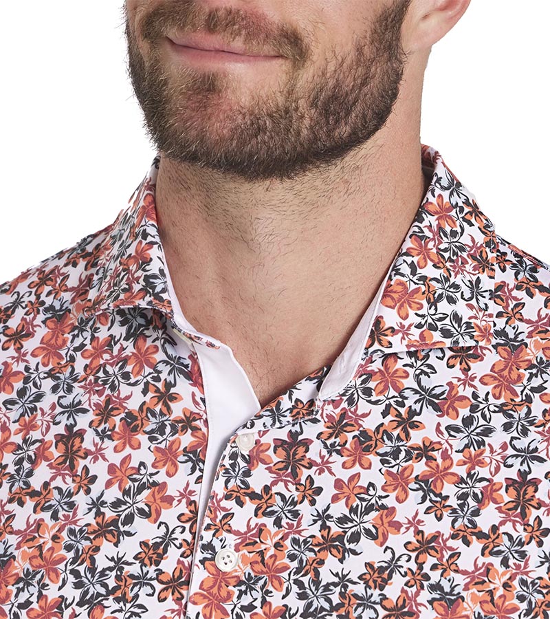 Puma Mens MATTR Lillie Golf Polo shirt closeup of collar in Intense Red / Silver Sky with a little lilies all-over floral print.