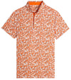 Puma Mens MATTR Lillie Golf Polo shirt Front in White Glow / Rickie Orange with a little lilies all-over floral print.