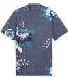 Puma Mens MATTR Terrance Golf Polo Shirt -back- in Deep Navy with a widely spaced group of tropical flowers & leaves on a small set geometric navy background.