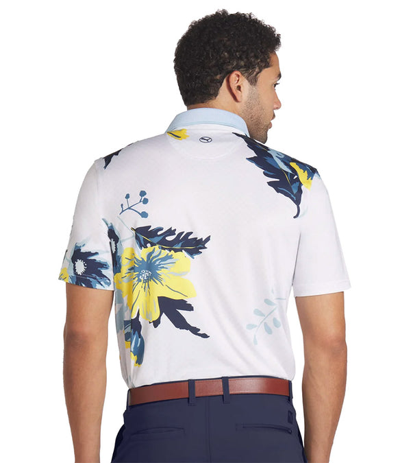 Puma Mens MATTR Terrance Golf Polo Shirt Model back in Silver Sky with a widely spaced group of tropical flowers & leaves on a small set geometric white on white background.