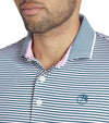 Puma Mens AP MATTR Traditions Golf Polo Shirt closeup of the collar in Cold Green / White Glow with a thin light/dark  horizontal stripe pattern, pink accent color on the inside of the collar. 3 button placket.