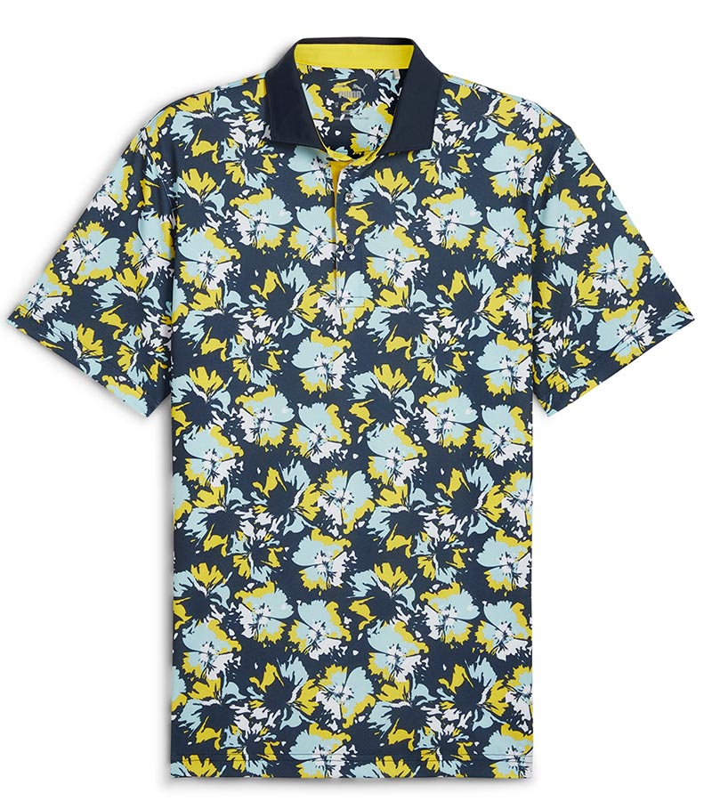 Puma Mens Pique Borrego Golf Polo Shirt front in Deep Navy / Silver Sky has a contemporary all-over floral pattern. The black collar with vibrant inner collar color of yellow and 3 button inner placket in yellow add a pop of coordinated color elevating the overall look.