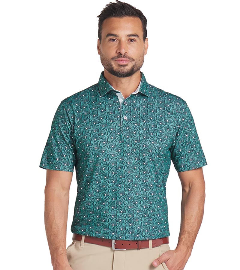 Puma Mens Pique Botanic Golf Polo Shirt Model Front in Aquatic / Puma Black with vertical rows of small leafy curled vines with a dot as an accent. The contrasting color of the inner collar and inner 3 button placket adds another fashion detail to lift this golf polo above the ordinary.