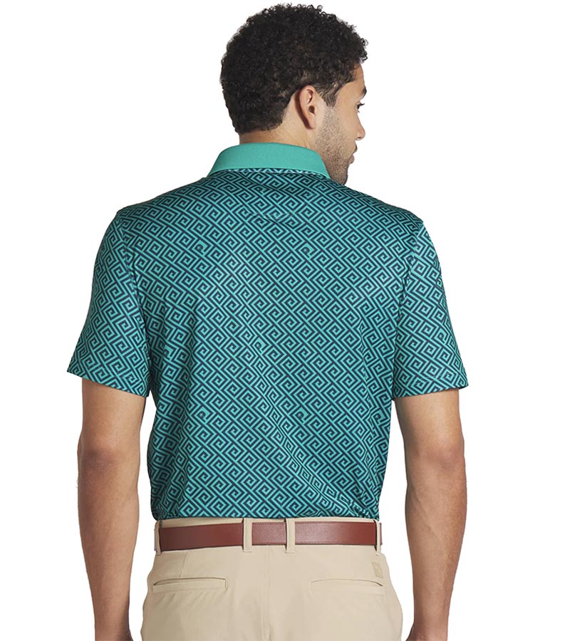 Puma Mens x PTC Resort Golf Polo Shirt Model - back in Deep Navy / Sparkling Green has an all-over Greek key design, a Sparkling Green collar with a solid coordinated Sparkling Green color on the inner collar and a 3 button placket.