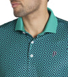 Puma Mens x PTC Resort Golf Polo Shirt closeup of collar in Deep Navy / Sparkling Green has an all-over Greek key design, a Sparkling Green collar with a solid coordinated Sparkling Green color on the inner collar and a 3 button placket.