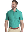 Puma x PTC Jacquard Golf Polo Shirt Model - front in Sparkling Green has large palm fronds widely spaced in a subtle monochromatic jacquard weave, a classis polo collar, and a 3 button placket