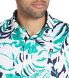 Puma Mens x PTC Palm Glitch closeup of collar in Sparkling Green / Fresh Mint has an all over pattern of large lush palm fronds, a classis polo collar, and a 3 button placket.