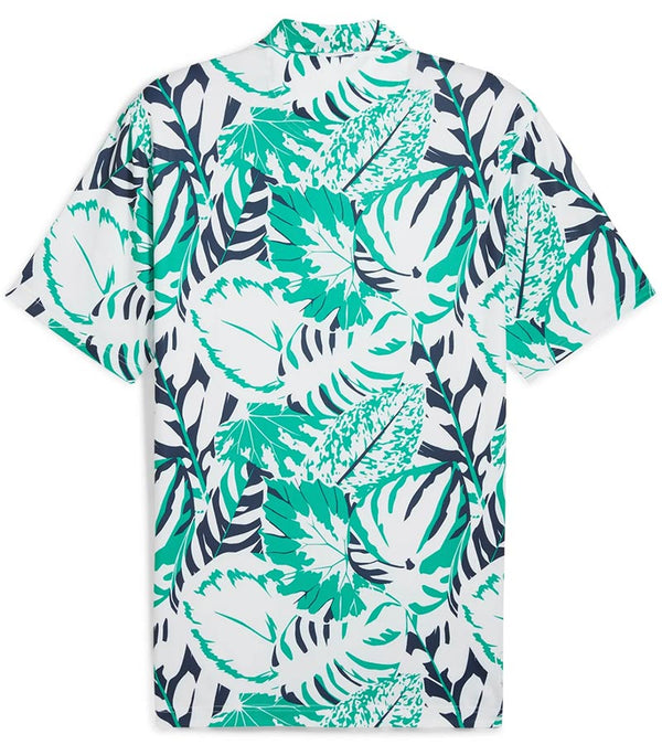 Puma Mens x PTC Palm Glitch Golf Polo Shirt Back in Sparkling Green / Fresh Mint has an all over pattern of large lush palm fronds, a classis polo collar, and a 3 button placket