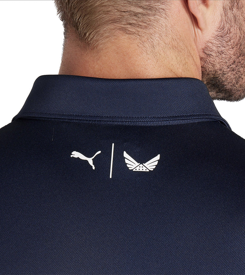 Puma Mens Volition Eagle Golf Polo Shirt - back in Deep Navy / Strong Red with Puma’s logo and Volition America’s emblem on the back collar highlighting the collaboration and commitment to honoring heroes.