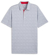 Puma Mens Volition Football Golf Polo Shirt -front in Deep Navy / White Glow with an all over small tossed footballs. The red accent color of the inner collar and 3 button placket gives a pop to the all over look.