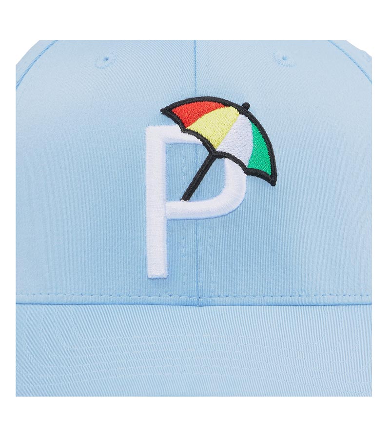 Puma Palmer P Golf Cap in Blue Bell / White Glow with closeup of the Palmer P logo with a colorful golf umbrella