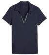 Puma Womens CLOUDSPUN Piped Golf Polo Shirt / Short Sleeve - front in solid Deep Navy. With a classic collar, the golf shirt’s standout feature is its piped detailing at the V neckline adding a touch of sophistication to the overall design.