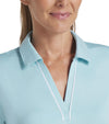 Puma Womens CLOUDSPUN Piped Golf Polo Shirt / Short Sleeve - in solid Safe Lake- closeup of  V-neck and collar detail