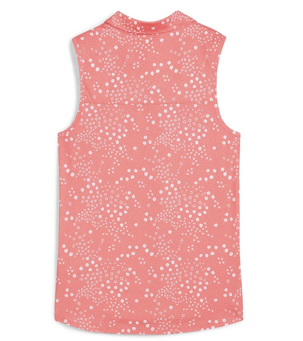 Puma Womens MATTR Hadley Sleeveless Golf Polo Shirt back in Salmon featuring a delicate tiny white floral & dots print with a classic polo collar and 5 button placket for a sophisticated, sporty look