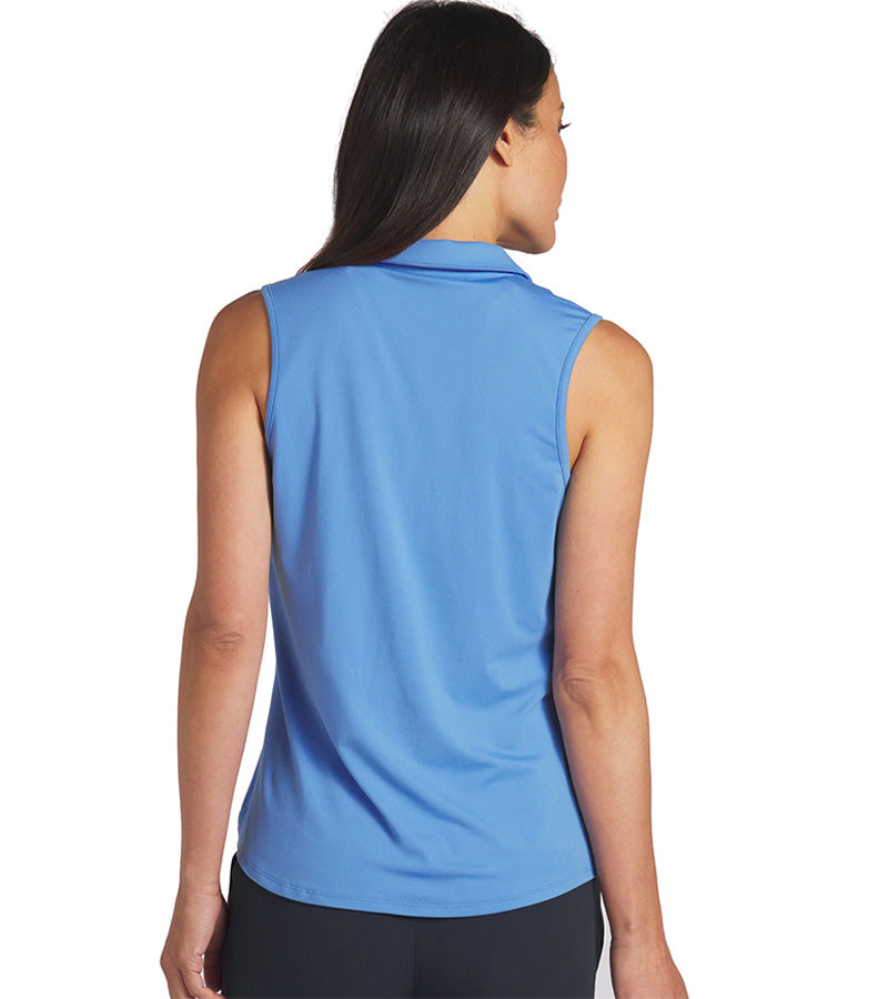 Puma Womens CLOUDSPUN Piped Sleeveless Golf Polo Shirt- model back in solid Blue Skies. With a classic collar, the golf shirt’s standout feature is its piped detailing at the V neckline adding a touch of sophistication to the overall design.