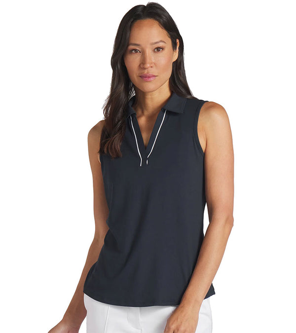 Puma Womens CLOUDSPUN Piped Sleeveless Golf Polo Shirt Sleeve in Deep Navy with model front view-  the classic collar neckline featuring piped detailing at the V neckline