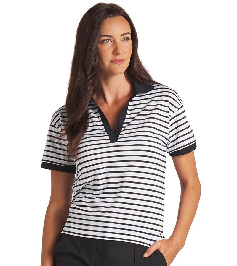 Puma Womens Everyday Stripe Pique Golf Polo Shirtrt- model front in striped White Glow / Puma Black featuring black piped detailing at the V neckline,  black  classic collar and black banded short sleeves adding a touch of sophistication to the overall design.