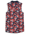 PUMA Women's Pique Borrego Sleeveless Golf Polo shirt -back in Deep Navy/Salmon has an abstract all over floral pattern solid  navy color accent collar and 3 button placket.