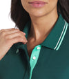 Puma Womens Pique Tipped Golf Polo Shirt shirt in solid Dark Myrtle
with closeup of neckline featuring a classic collar with light green & white contrast piping and a light green three-button inner placket.