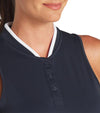 PUMA Women's Range Pique Sleeveless Golf Polo shirt in solid Deep Navy with closeup of neckline featuring a ribbed collar with white contrast piping and a three-button placket.