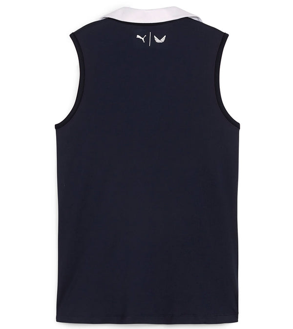 Puma Womens Volition Piped Sleeveless Golf Polo -back in Deep Navy features a classic sleeveless design with distinctive contrast details with a contrasting collar and signature red piping along the V-neck placket.