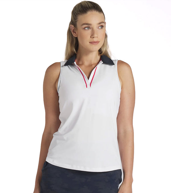 Puma Womens Volition Piped Sleeveless Golf Polo model front in White Glow features a classic sleeveless design with distinctive contrast details with a contrasting collar and signature red piping along the V-neck placket.