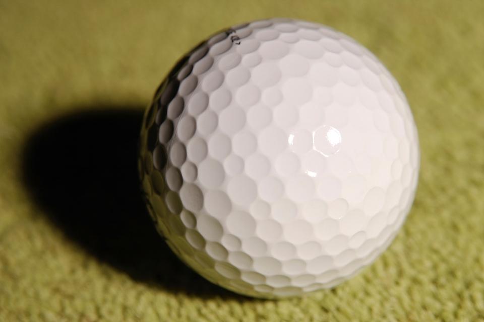 close up of golf ball dimples