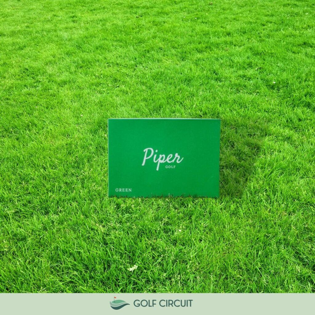 piper green golf balls on grass