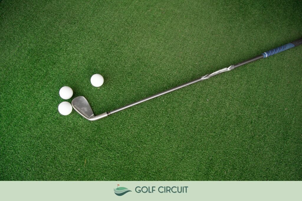 Finding the right lie angle on golf club laying on turf